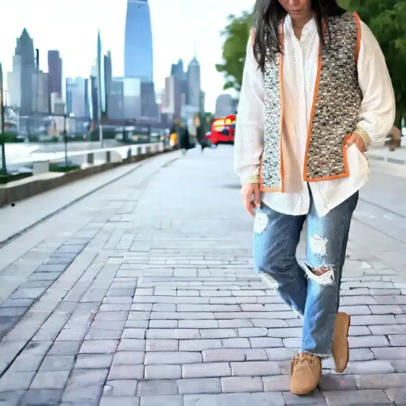 orange ember vest in the street