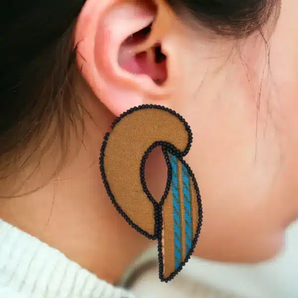 handmade Rokh earring on woman ear